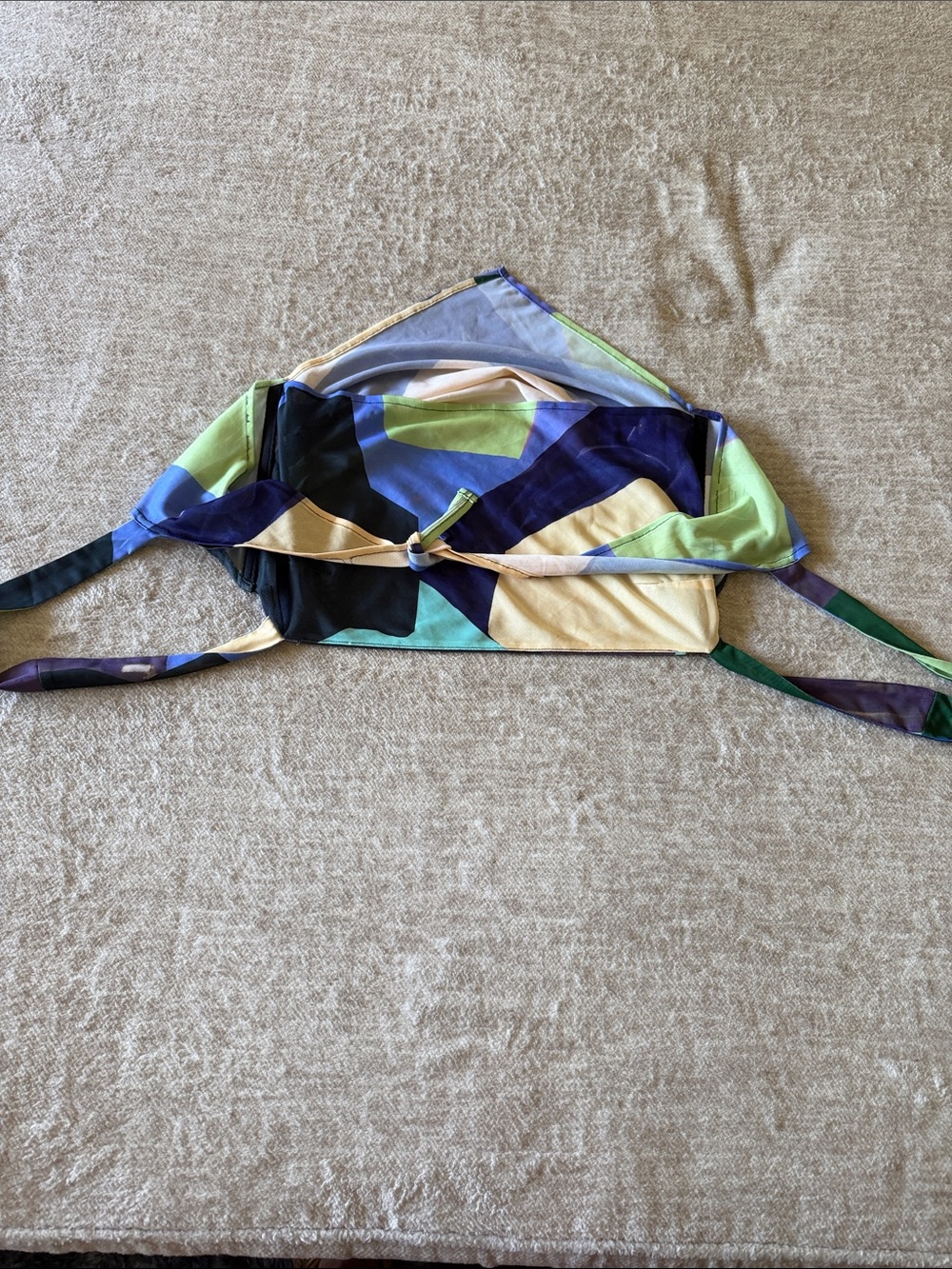 Halter top ties around neck very cute.
